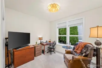 Main-floor guest suite or office with 3/4 bath and garden views.  It's ideal for work, relaxation, or hosting overnight guests.