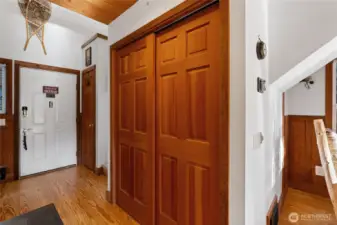 Pantry closet between kitchen and entry