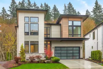 Each residence professionally designed Lanscaped yard maintained by HOA. Stunning NW Contemporary designs feature stained cedar and stone details, glass panel garage doors, and modern black windows