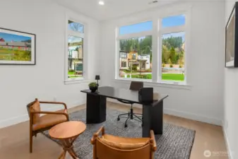 Main floor bedroom off entry perfect for home office