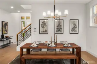 Small details like the steel open rail with stained caps throughout this thoughtfully designed home