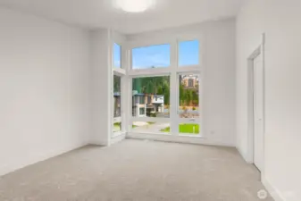 One of 3 spacious secondary bedrooms on the upper floor. Upper floor features 4 beds + rec room