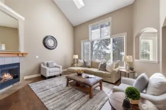 Family room with gas fireplace and built-in cabinetry.
