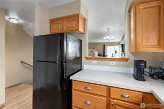 Pass-through window to dining room.