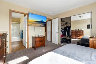 Primary bedroom with en suite bathroom.