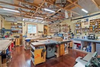 large workshop with hardwood floors