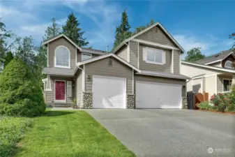 A 3 car garage PLUS a  long driveway offers space for everyone in the family and visitors.