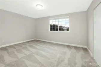 2nd Bedroom on Upper level without virtual staging. -Very spacious PLUS oversized closet!!