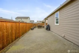 Poured concrete extended patio for extra parking, storage, or entertaining