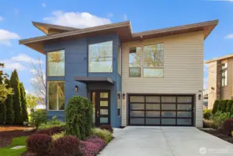 2 car garage with one car charging port.