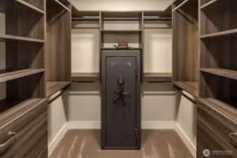 walk-in closet with safe.