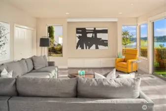 The ground floor family room is set up for movies and game nights.