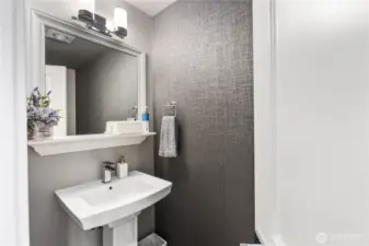 Powder room with designer wall paer