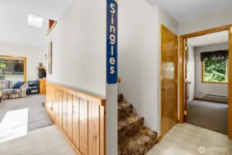 Hallway to upstairs & main floor bedroom