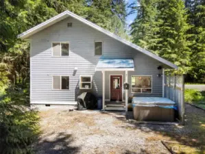 Backyard w/ rear entrance + hot tub