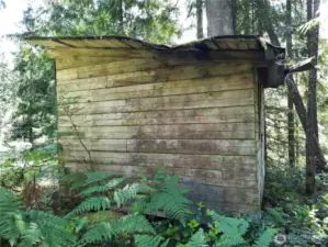 Cedar outbuilding that has served as a sauna.
