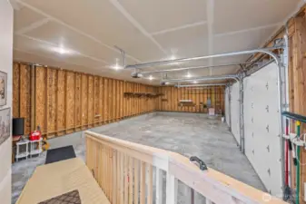 Huge 3 garages with 10 ft x 10 ft garage doors and tall ceiling. Ramp for wheel chair.