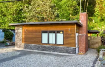This cute beach bungalow backs a gorgeous treed hillside. 2 bedroom/1 bath bungalow fully renovated from 2018-2021 and is located across the street from McKee's Beach! Just 2 doors from the beach access and a few doors the other direction from the boat launch! Comes fully furnished (minus the staging) and Short-Term Rentals are allowed!