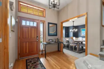 Real wood front door and gleaming hardwoods