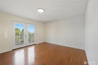 Primary bedroom with french doors to deck #2