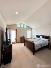 Master bedroom Bight and Spacious With Private Door Access to Balcony.
