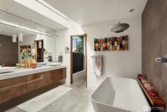 Large soaking tub with ceiling mount tub filler