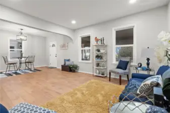 Enter into this lovely remodeled home with Living & Dining Rooms w/New Laminate Flooring. Vinyl Windows, High Ceilings, New Lighting.