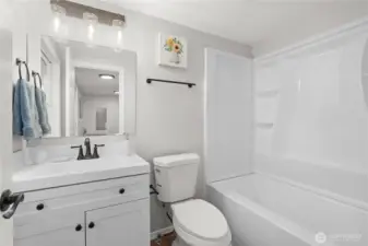 2nd Full Bath: New Vanity, Plumbing & Fixtures, Tub/Shower Surround, Toilet, Laminate Flooring.