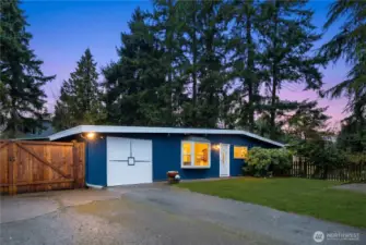 Welcome home to this spacious, versatile home in Tukwila, tucked away down a private road yet incredibly convenient to the light rail, the airport, and Southcenter shopping!
