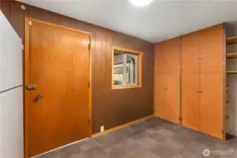 A convenient mud room off the back of the home means extra storage and a place to hang up wet coats and leave muddy shoes (or wipe muddy paws)