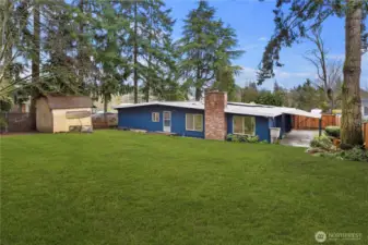 Imagine having space to run and play in this fully-fenced backyard!