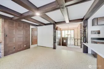 Beamed ceilings and wood paneling
