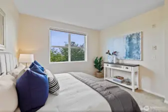 Window in primary bedroom looks out to territorial views. Slide open for a fresh air breeze any time of year.