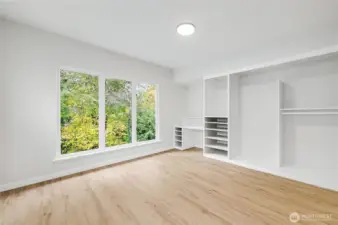 The 2nd bedroom has ample closet space and a built-in desk, very nice!