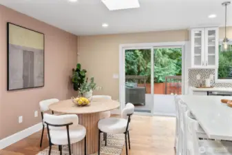 Sunny eating nook off the kitchen with easy access to the deck and backyard.