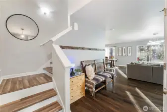 The open entry has great space for dropping your keys and bags. There is a coat closet to the right