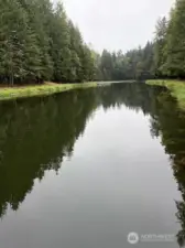 Full view of Horseshoe Lake tucked behind the home