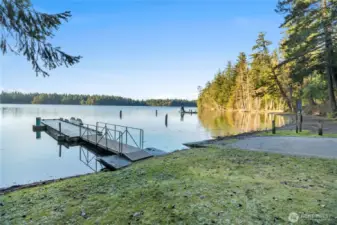 The private swim beach with dock and slide is a fun summer spot and has a dock for launching your fishing boat, paddle boards & kayaks