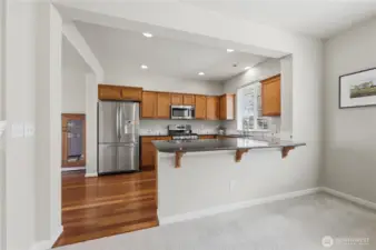 Open kitchen with eating bar for entertaining!