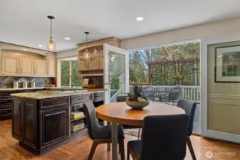 French doors towards the deck offer options galore and an easy flow for entertaining