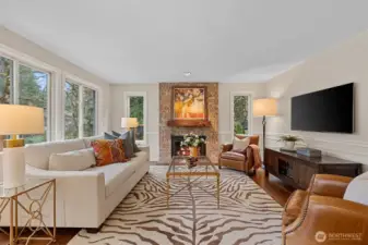 Family room is bright and offers one of 2 fireplaces