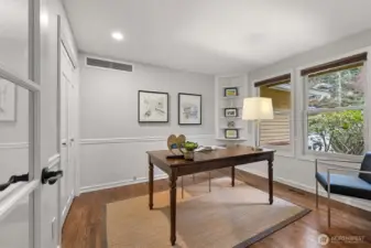 Main floor office has a closet and can be used as a main floor bedroom