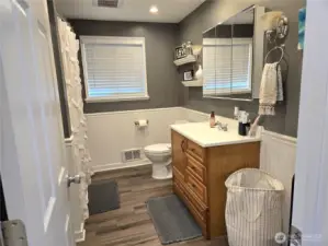 This bathroom is big enough to convert to 2 bathrooms to create a primary suite.