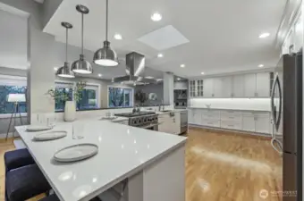 Oversized kitchen with eating area.