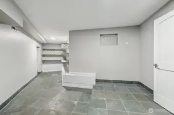 Ample Mudroom from Garage entrance and extra storage.