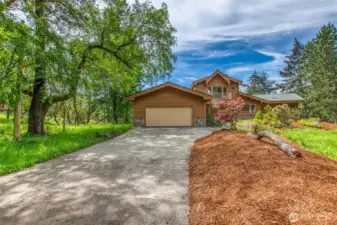 Attached 2 car garage with ample space for shop inside. Aggregate drive, big enough for a RV or boat parking