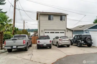 2 car garage plus extra parking in front of it.
