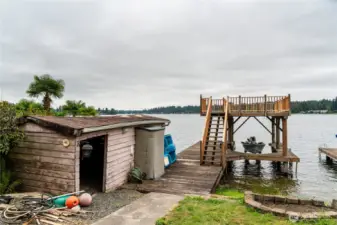 The boat house needs some TLC, replace 1 wall at a time. The roof is not leaking. Boat houses are a rare find!