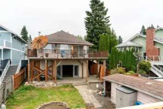 Showing walk out basement right to the dock. Full length patio & wrap around deck.