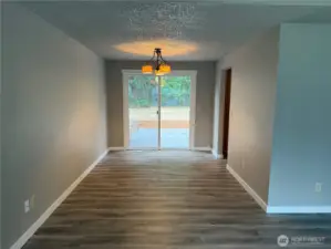 Dining Room. Wall could be easily removed to open up kitchen area. Non-load bearing.